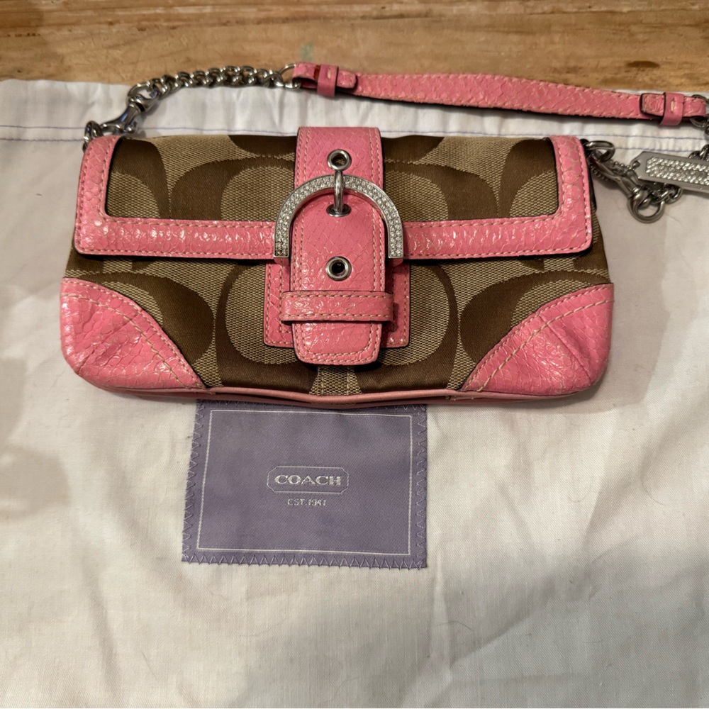 Rare Vintage Coach Handbag with pink Alligator Trim and rhinestone buckle.